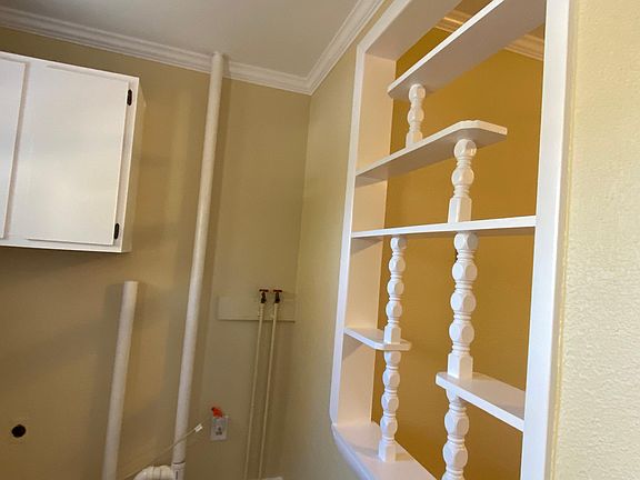 Laundry area leading to back porch.