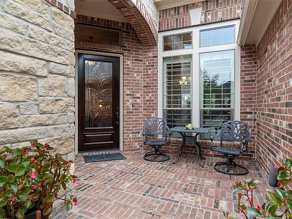 A handsome welcome for your family and guests. Very attractive courtyard with a wrought iron gate entrance and leaded glass front door plus covered porch. Fully guttered for your convenience.
