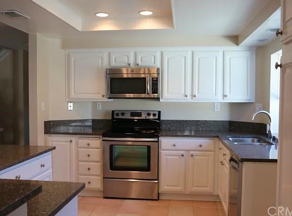 New Quartz Countertops and Stainless Steel Appliances