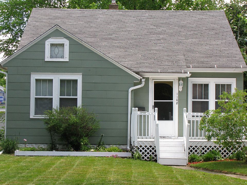 Great porch and flower beds
