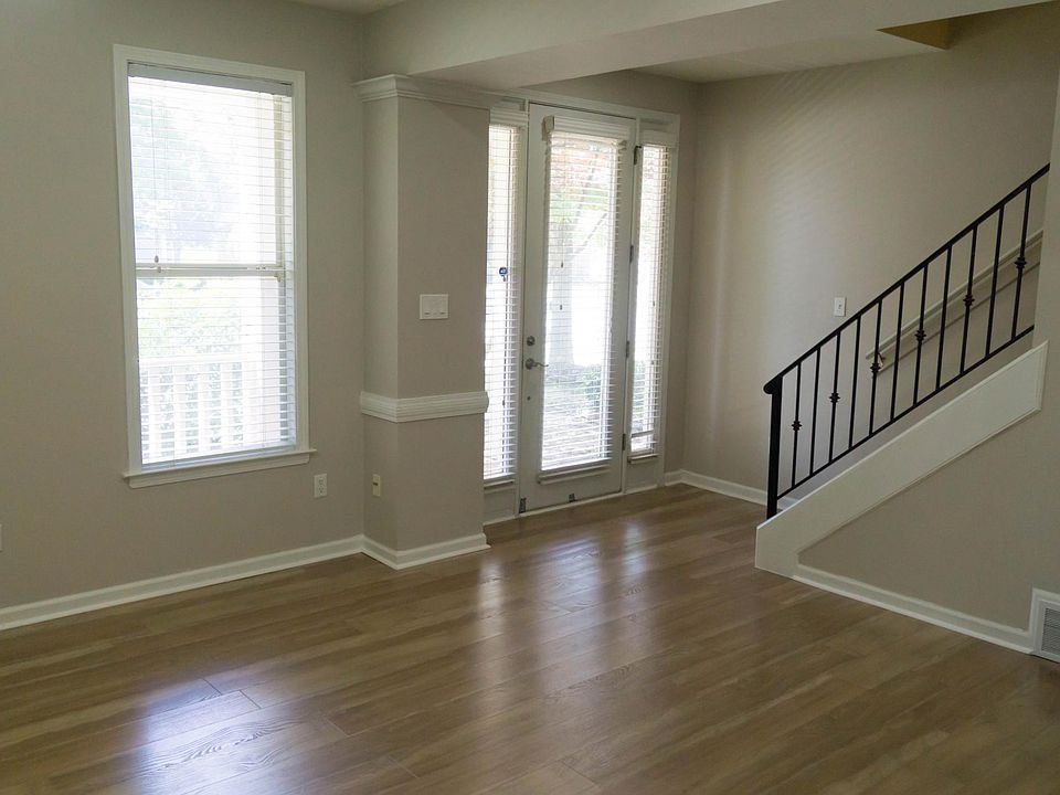 front door , entry way and living room