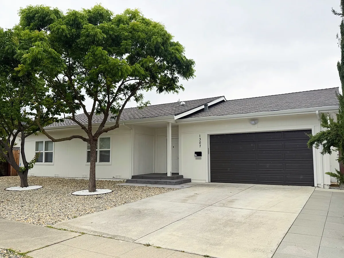 Newly installed 40-year roof, gutters provide peace of mind. Ample parking in the two car garage, driveway and the quiet street. - Daphne Dr