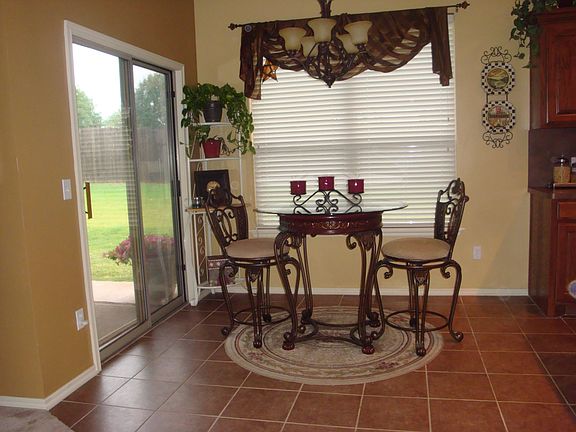 Eat in kitchen surrounded by windows
