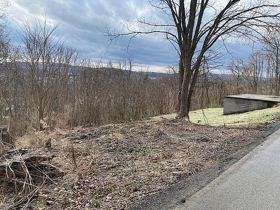 Carport base still stands.