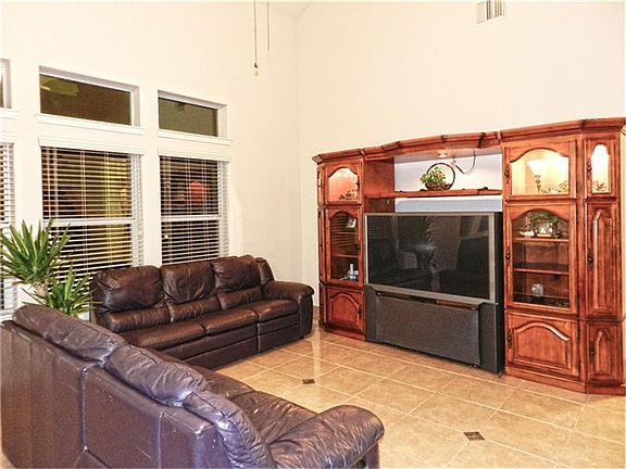 Family room is integrated to the kitchen and formal areas, making this floor plan a good option to e