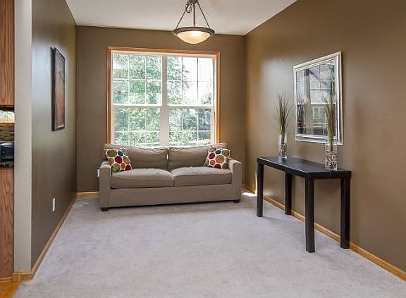 Beyond the formal dining room and just off the kitchen is this flex room This room could serve as an additional living room, toy room or home office!