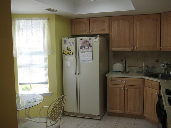 Bright sunny kitchen with pass thru to dining room.