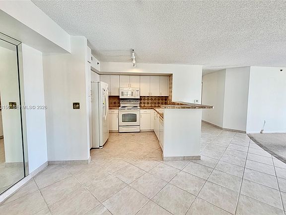 3rd image of 19877 E Country Club Dr #3408