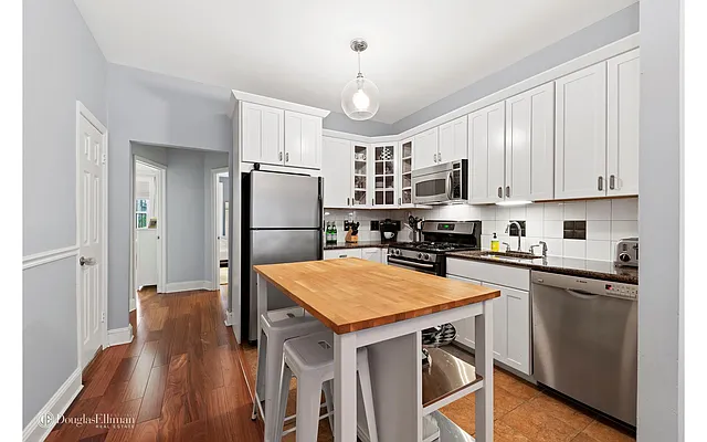 Sold by Douglas Elliman | media 13