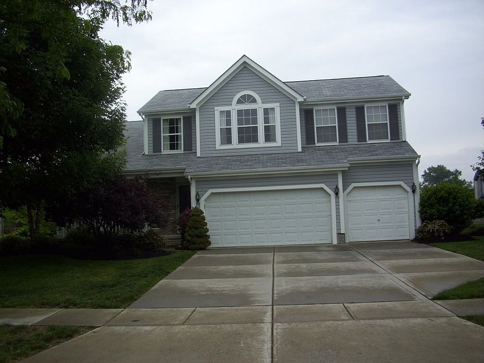 Front house 3 car garage
