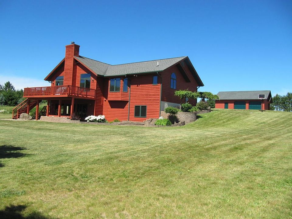 View of home and additional garage