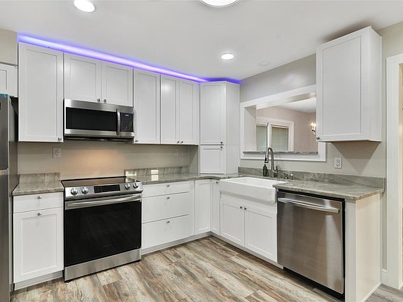 Natural Skylight Tube installed and is a nice way to light up a kitchen that is in the middle of the home, bringing in the natural outdoor feel, plus saving energy at the same time!! Win!