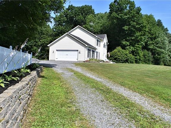 This peaceful setting awaits you at the end of a 1000 Ft lane . The lane is used by 2 families - this property has the prime spo