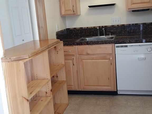 Kitchen opens to living room