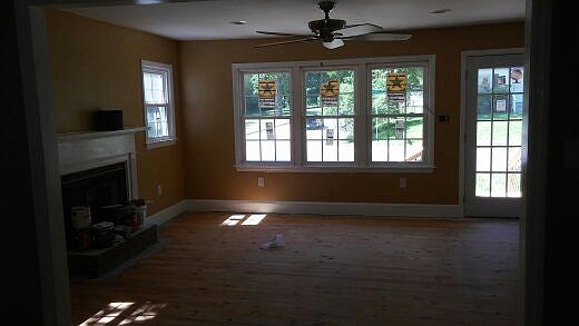 Large living room with real log fireplace