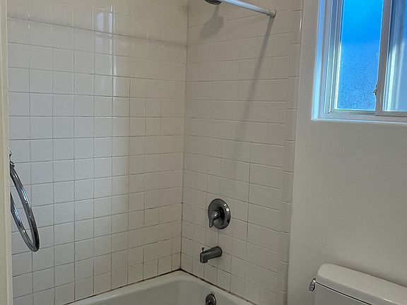 BATHROOM WITH WHITE SUBWAY TILES