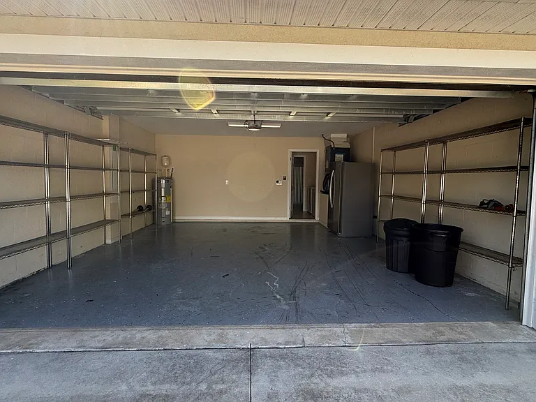 Garage comes with shelves for your tools and garden equipment.