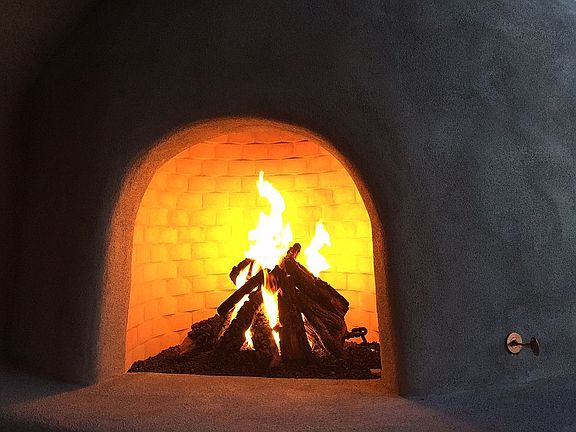 Adobe fireplace outside
