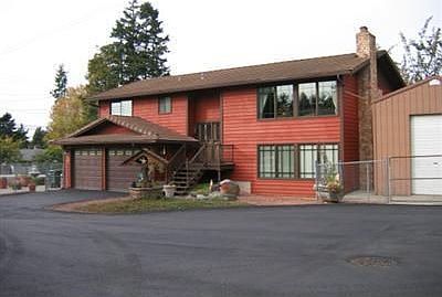 Front Of House Faces South And Captures the light. Note The Upgraded Upgraded Windows in the Living 