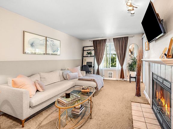 Working fireplace, deck access through living room and bedroom.