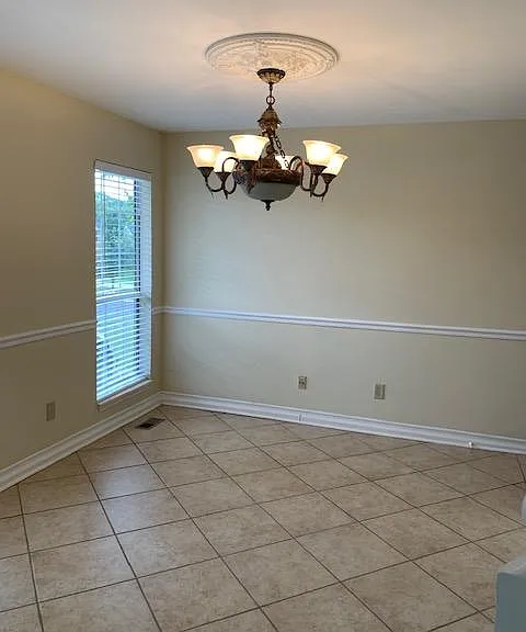 Formal dining room to left of entrance