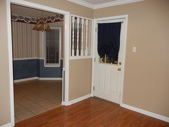 View looking from den into kitchen