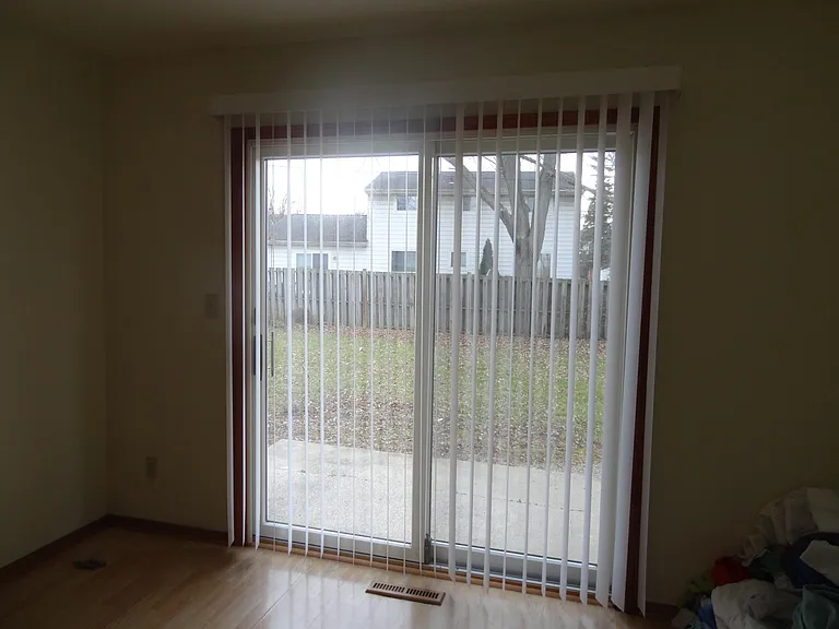 Large dining area with screened back door to large secure and private backyard. Your Pets will Love this. You have Detached Garage access from here.