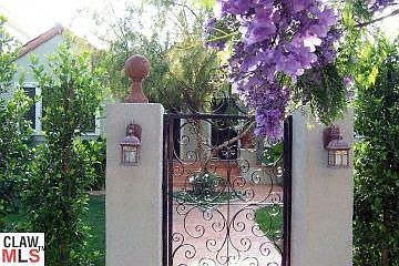 Gated Entry to charming courtyard