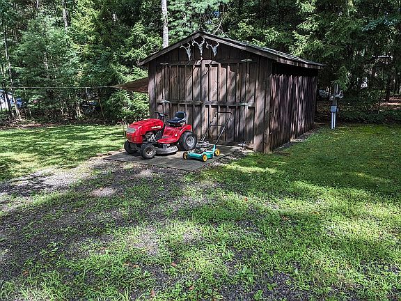 12' x 16' Shed with Mowers.