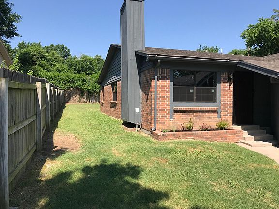 Fenced side and back yard.