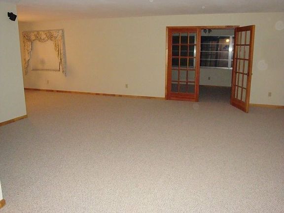 Living room open to dining room and sun room