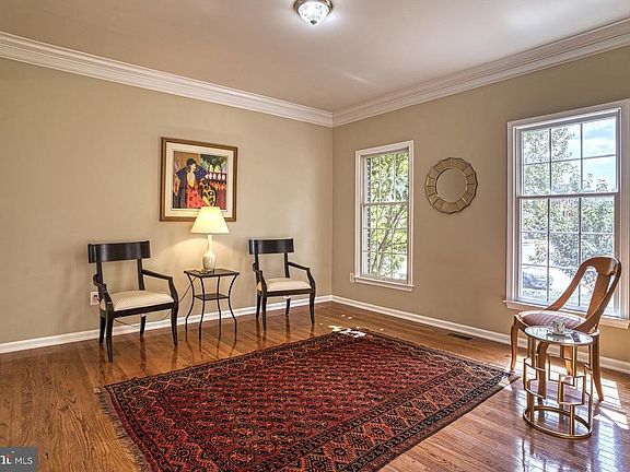 lovely living room with crown molding