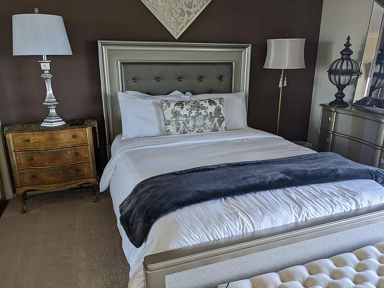 Unwind in a serene coastal retreat with panoramic ocean and harbor views. Enjoy a restful night on a premium queen-size mattress. Luxurious high-thread-count linens, a Smart TV, make your stay effortlessly indulgent.
