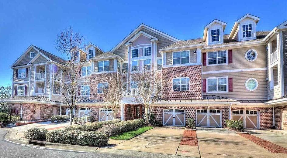 Secure building, code required. Private garage and driveway