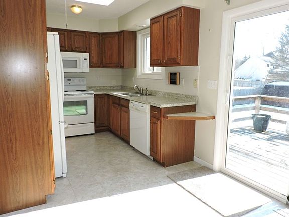 Open to the dining area with large slider to the deck.