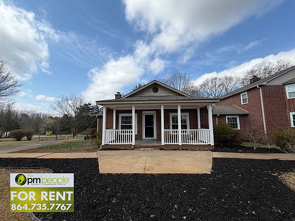 Enjoy a covered front porch, easy access to parking and garden beds that spring to life in warm weather!