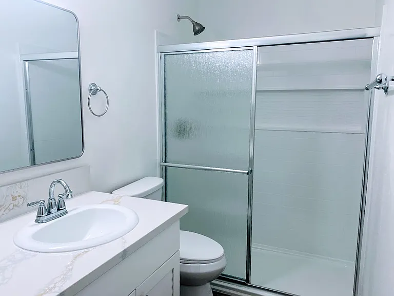 Village Apartments — Photo 14