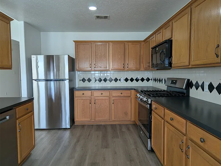 5618 Savannah Woods Ln — Photo 21