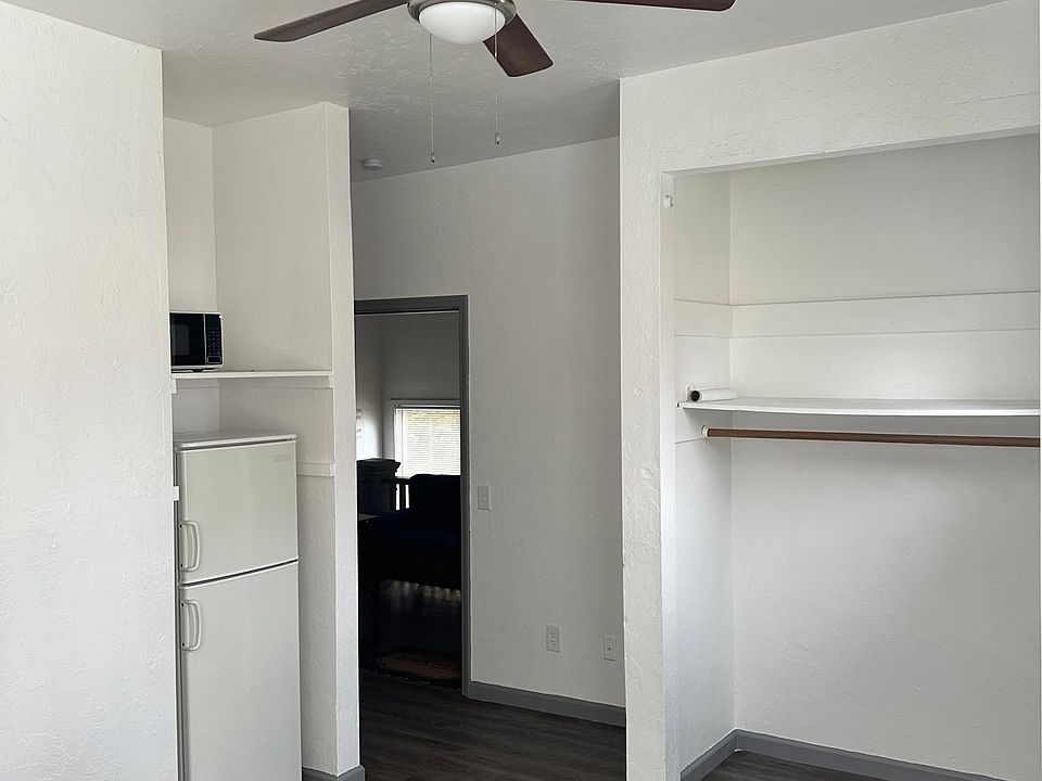 own fridge freezer in unit with microwave