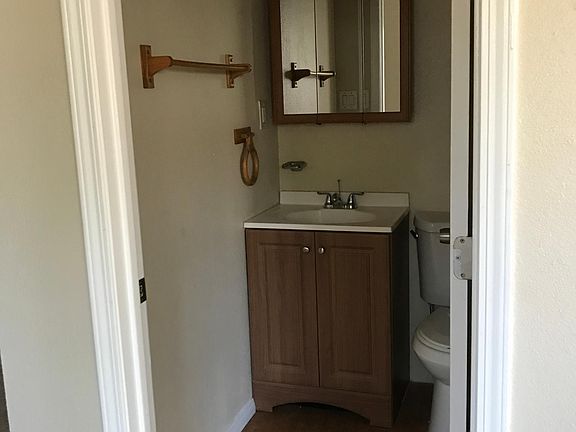 Cute small bathroom with Shower and Tub.