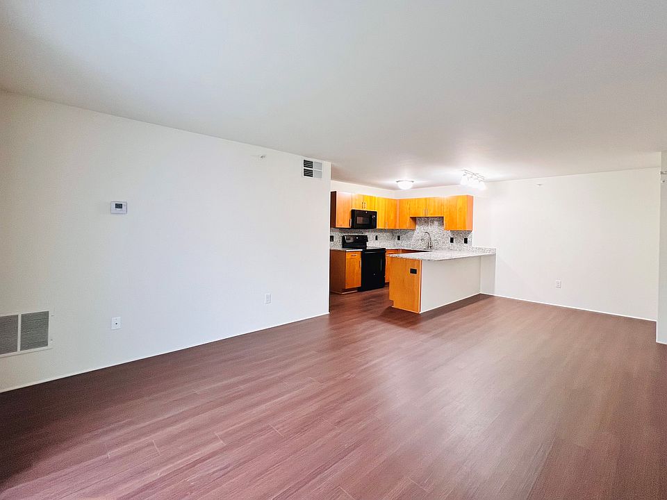 Flow from Open Kitchen into Spacious living are with access to private balcony.