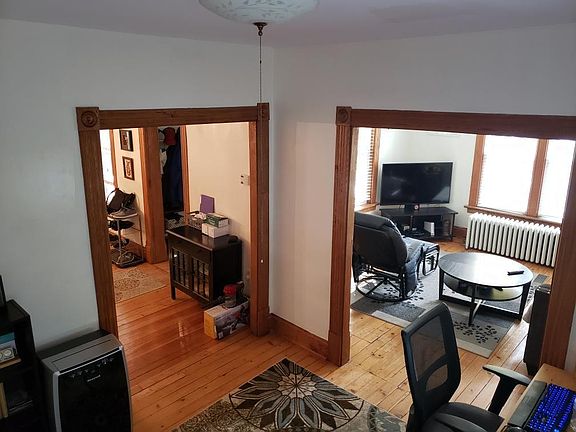 View from office area. Living room to the right. Dining room to the left.