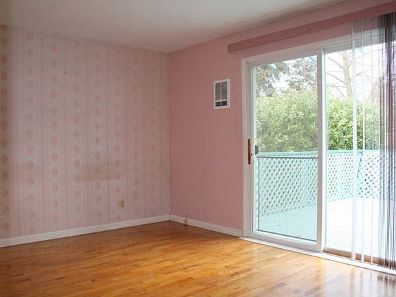 The master bedroom has sliders leading out to the deck - great for that early morning cup of tea or 