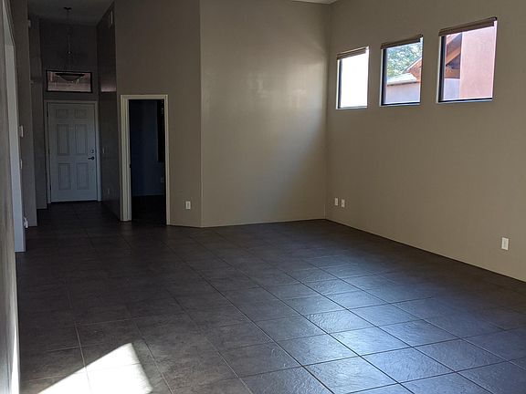 Living Room (View from Kitchen.)