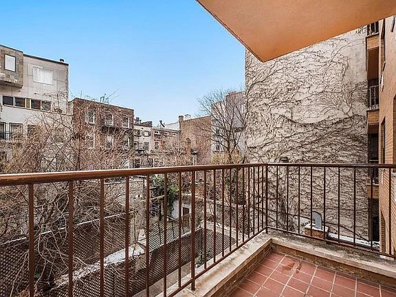 5th image of 394 E 8th St APT 6C