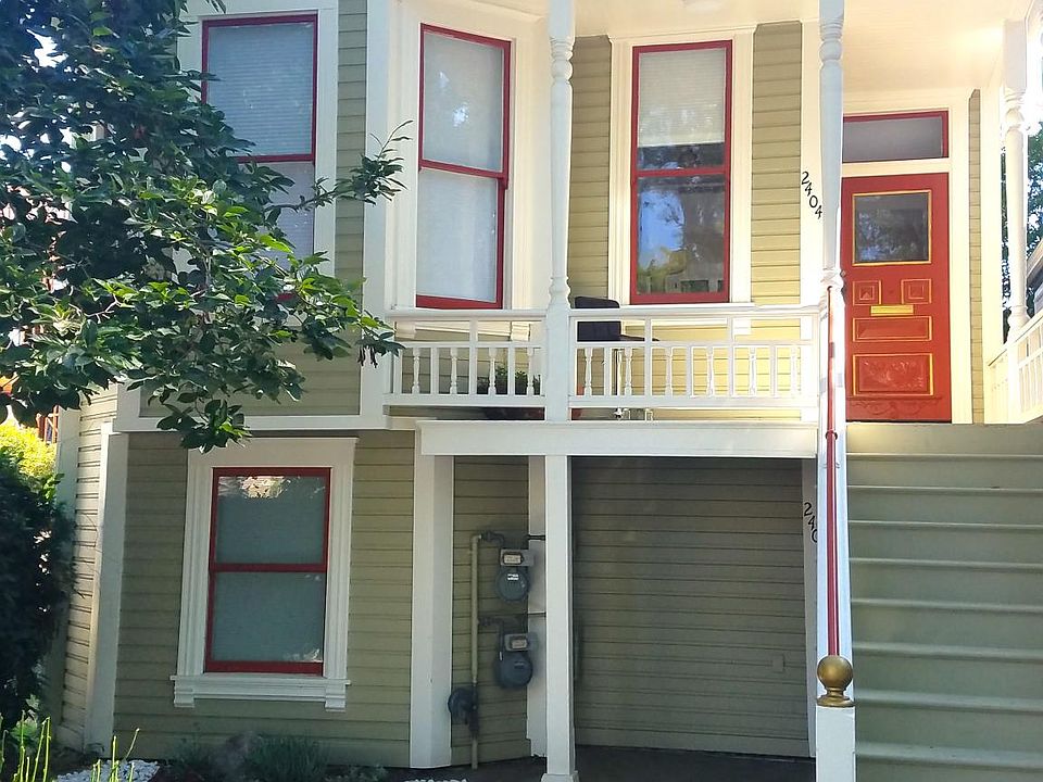 Front of house. Unit for rent is on the ground floor.