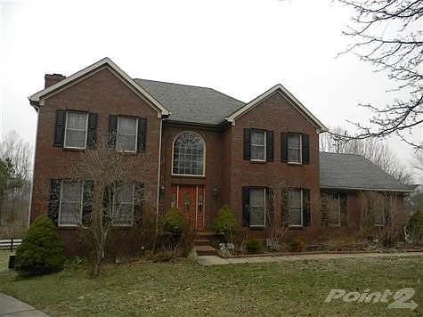 Stately 2-story brick at the end of a quiet cul-de-sac.