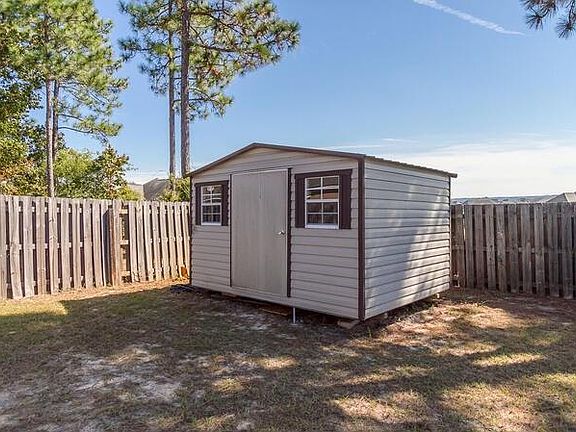 Fenced Back yard with Shed