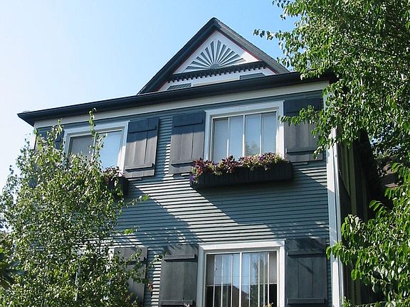 Lower windows are the 1st floor, upper windows are owners' apartment