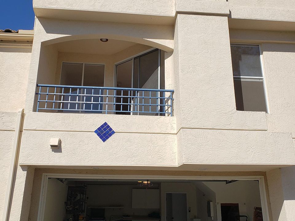 Front view of home and 2-car garage
